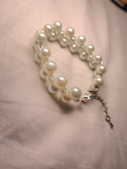 Bracelet tressé blanc nacré